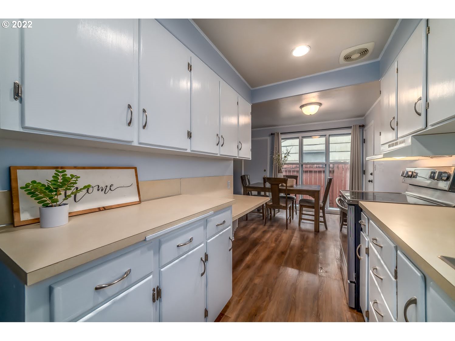 1453 Olympic Street Springfield, OR 97477 - Photo 16 of 31 a kitchen with stove and cabinets