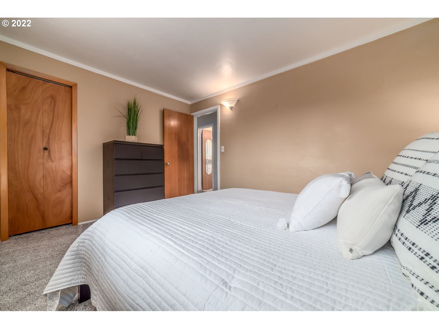 1453 Olympic Street Springfield, OR 97477 - Photo 18 of 31 a bedroom with a bed and a closet