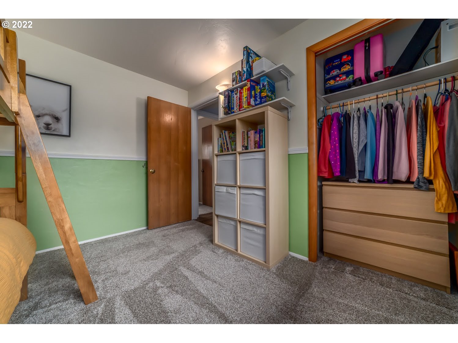 1453 Olympic Street Springfield, OR 97477 - Photo 20 of 31 a view of walk in closet with clothes and shoes