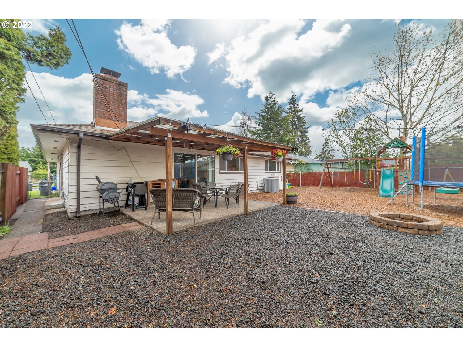 1453 Olympic Street Springfield, OR 97477 - Photo 25 of 31 a view of a house with a yard