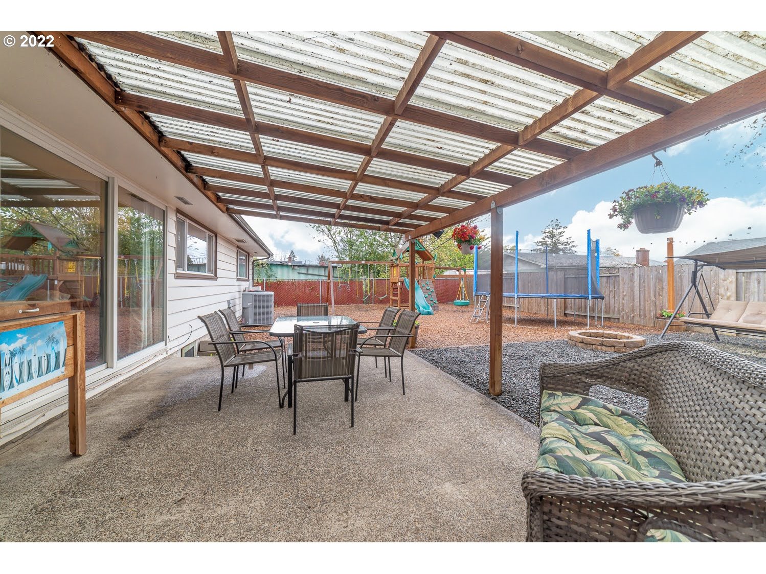 1453 Olympic Street Springfield, OR 97477 - Photo 27 of 31 a view of a porch with chairs and backyard