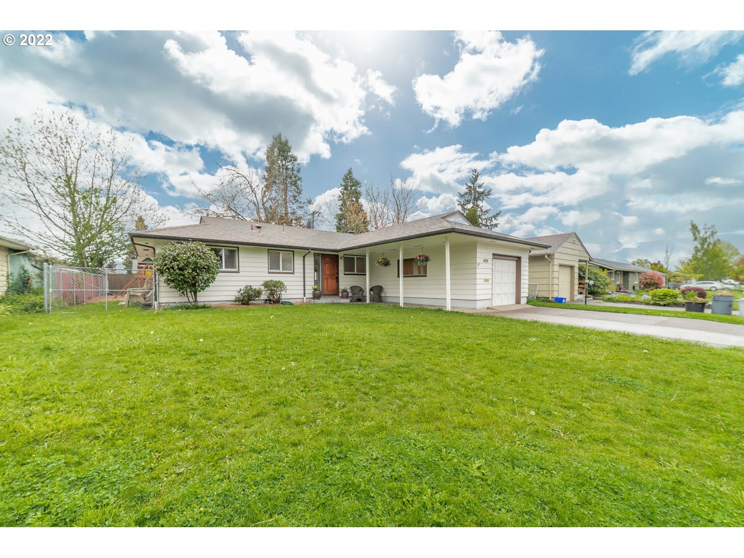 1453 Olympic Street Springfield, OR 97477 - Photo 3 of 31 a view of a yard in front of a house