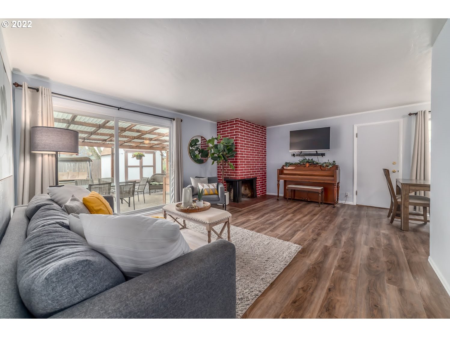 1453 Olympic Street Springfield, OR 97477 - Photo 8 of 31 a living room with furniture and a wooden floor