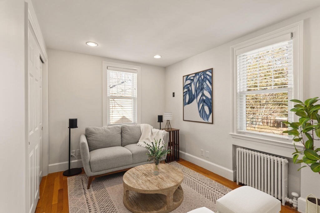 55 Harding Road Lexington, MA 02420 - Photo 11 of 18 a living room with furniture and a large window