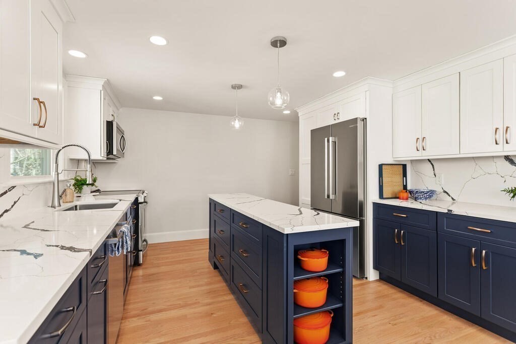 55 Harding Road Lexington, MA 02420 - Photo 6 of 18 a kitchen with stainless steel appliances granite countertop a sink stove and refrigerator