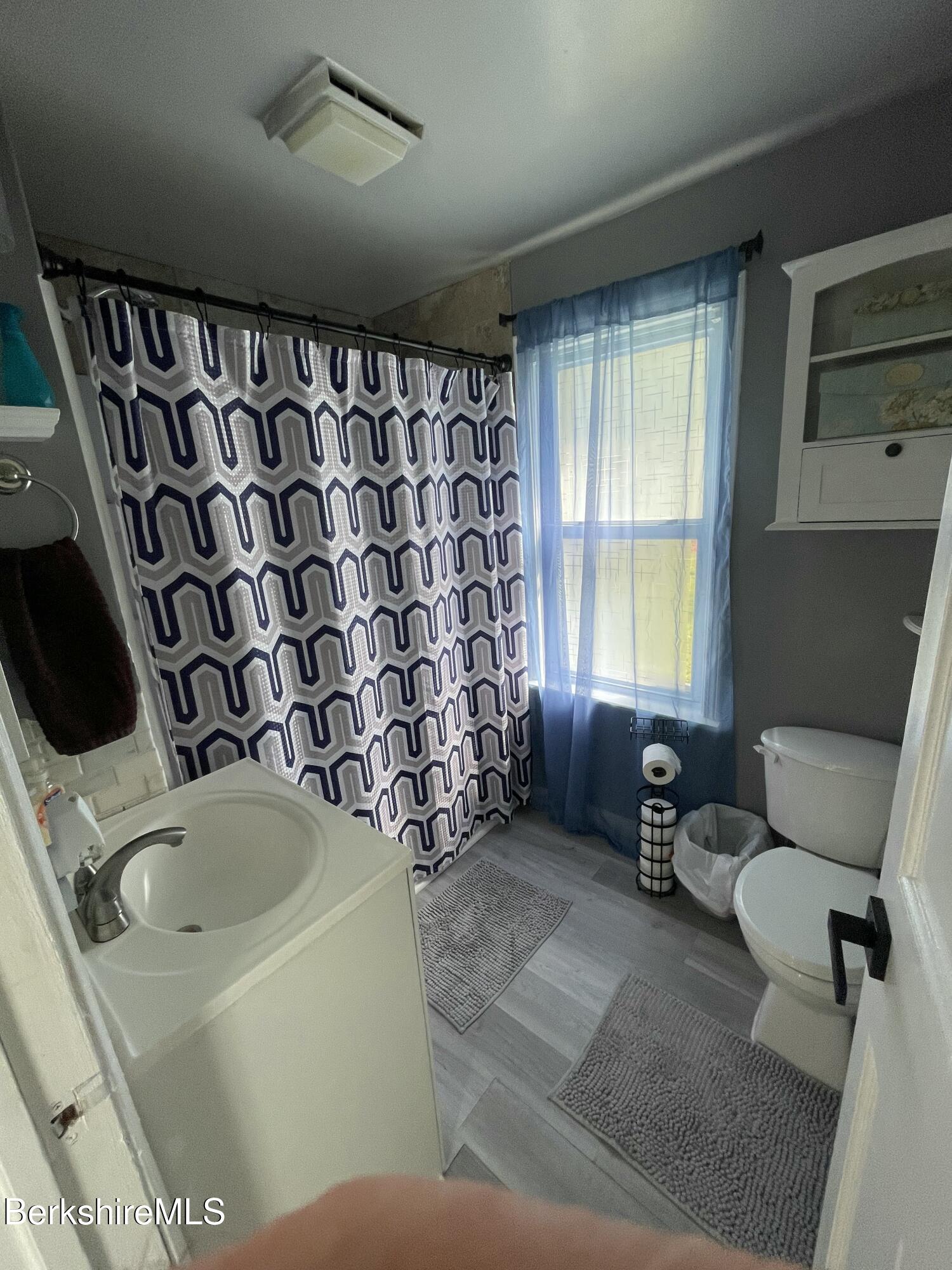 51 Foote Avenue Pittsfield, MA 01201 - Photo 13 of 16 a bathroom with a sink toilet and shower