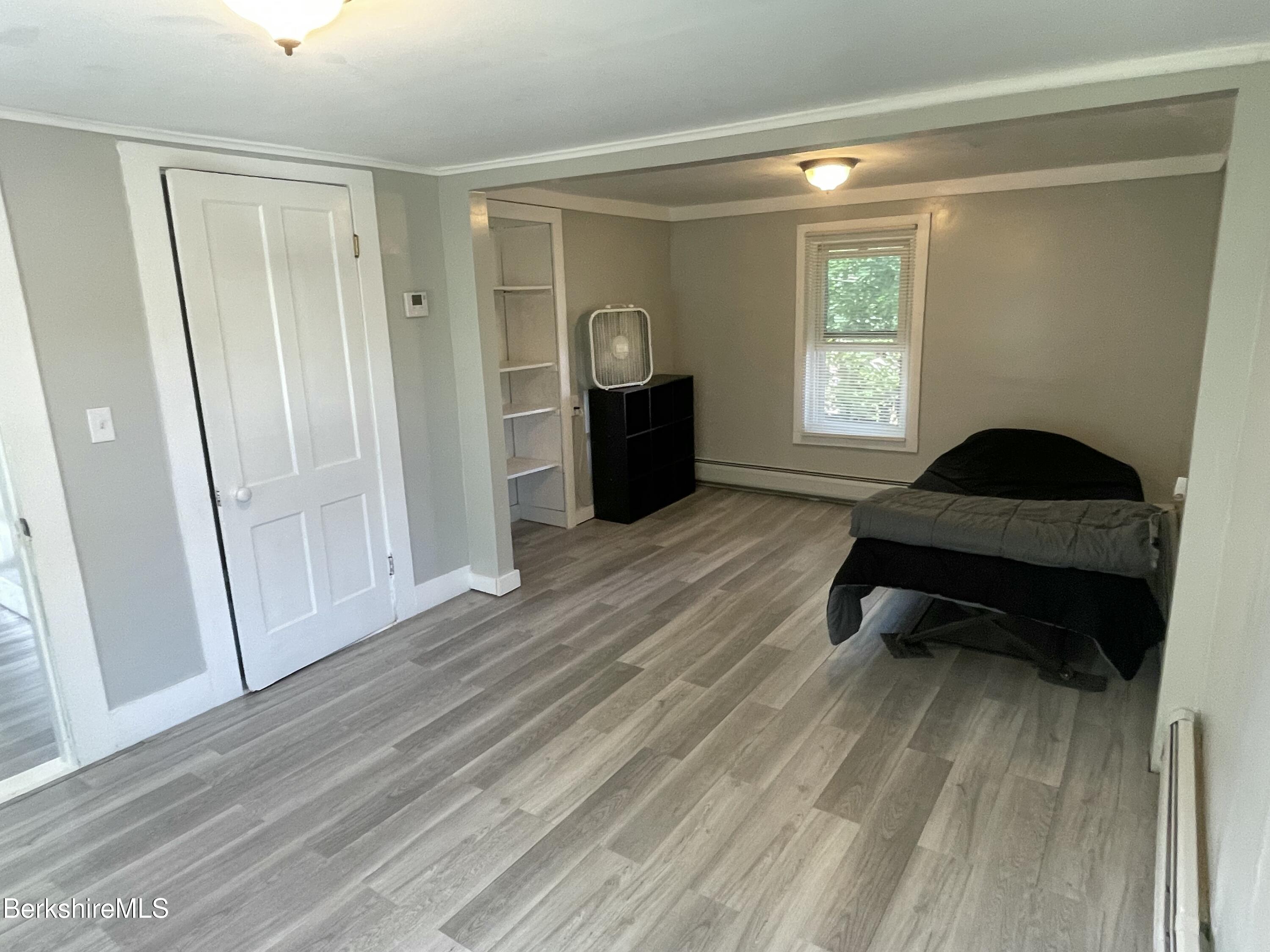 51 Foote Avenue Pittsfield, MA 01201 - Photo 14 of 16 a living room with a bed furniture and a window