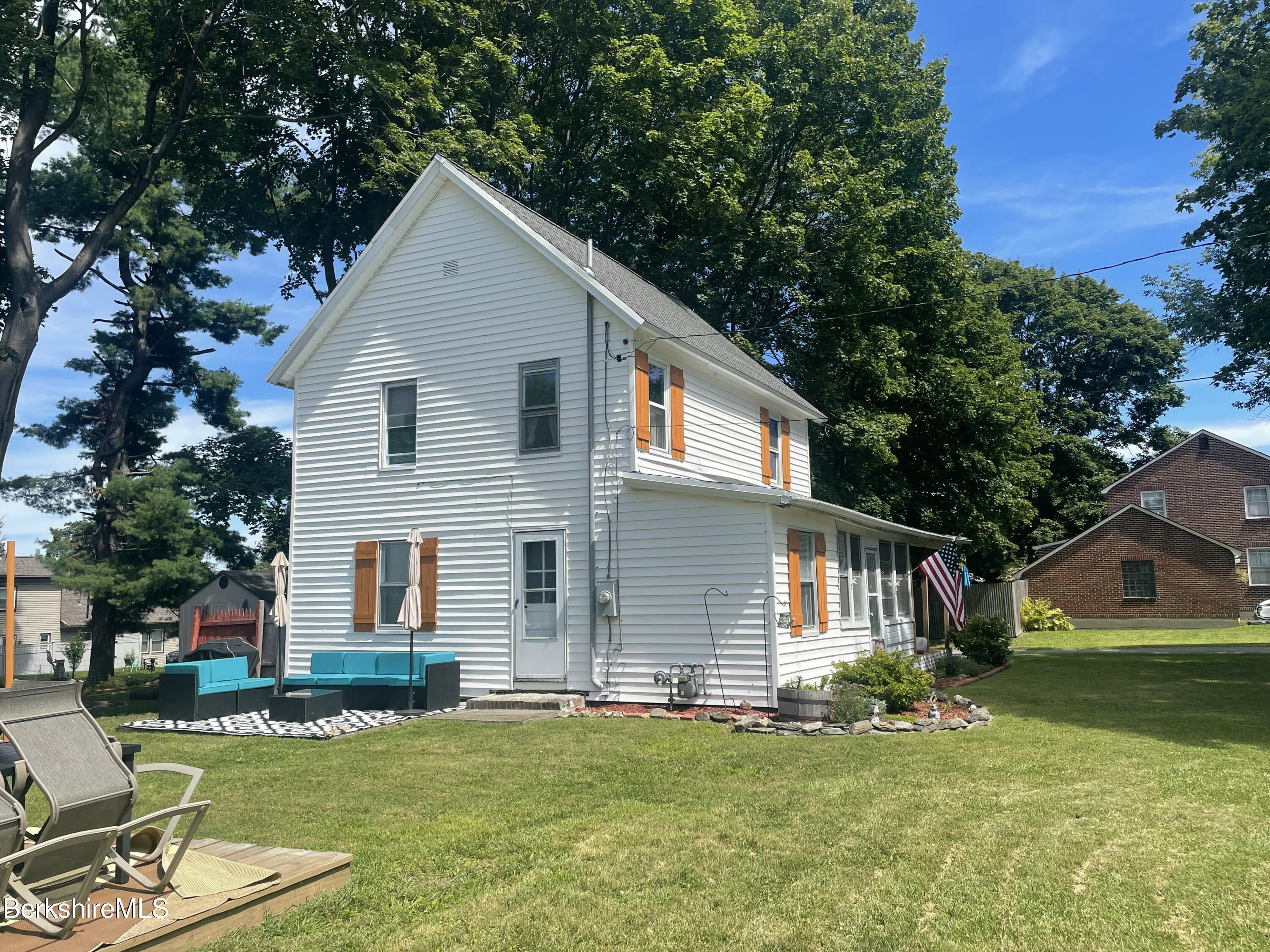51 Foote Avenue Pittsfield, MA 01201 - Photo 5 of 16 a front view of a house with a yard