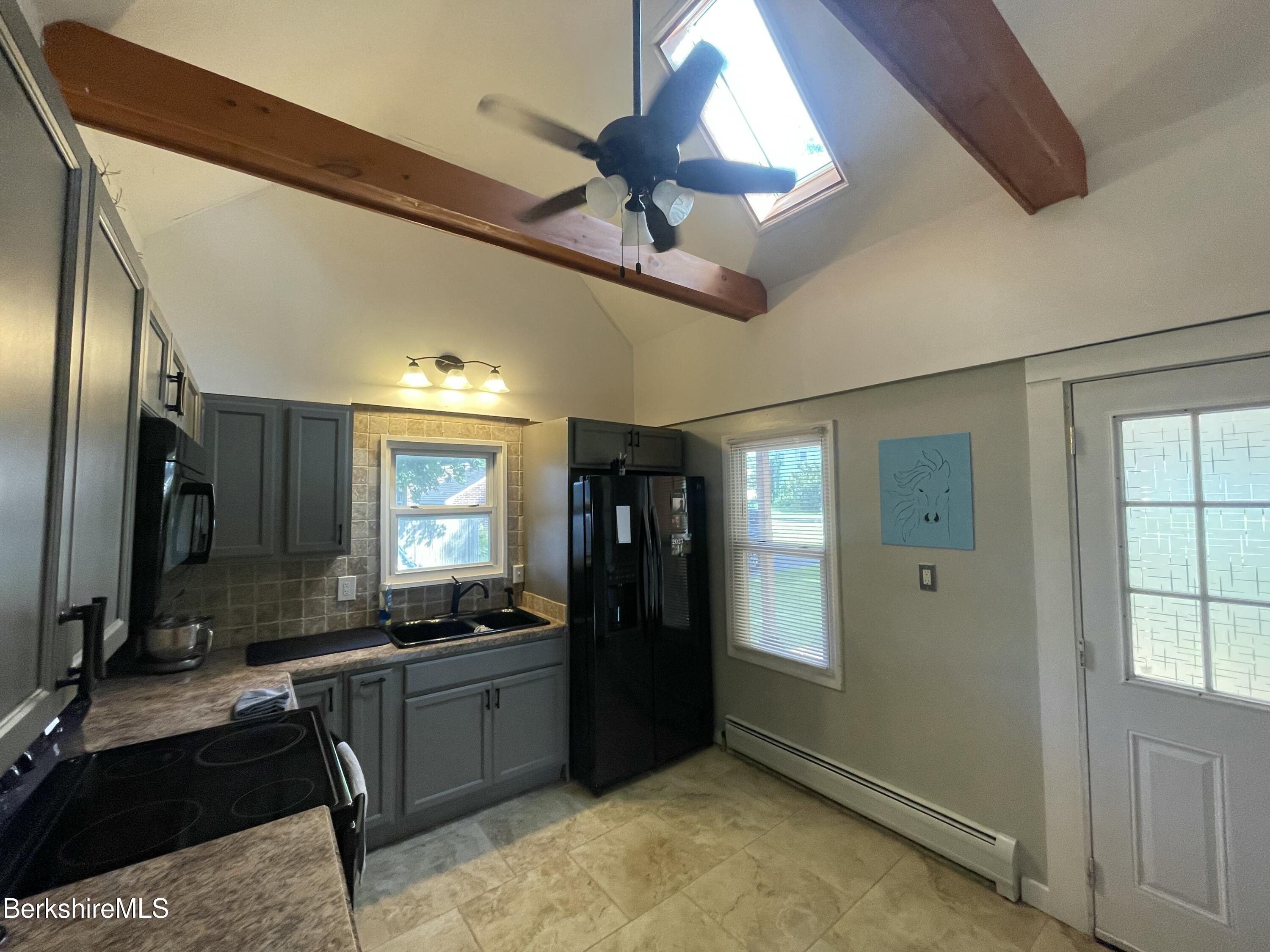 51 Foote Avenue Pittsfield, MA 01201 - Photo 9 of 16 a kitchen with a refrigerator and a sink