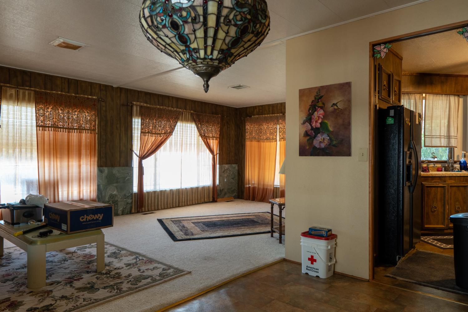 2500 North State Highway, Unit 36 Merced, CA 95348 - Photo 11 of 50 a living room with furniture and a window