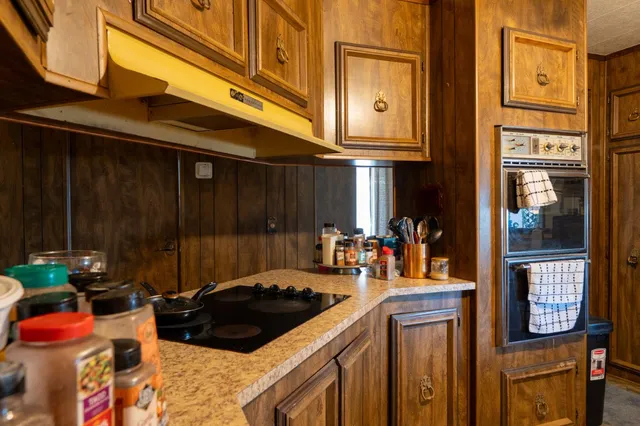 a view of a two chairs in the street