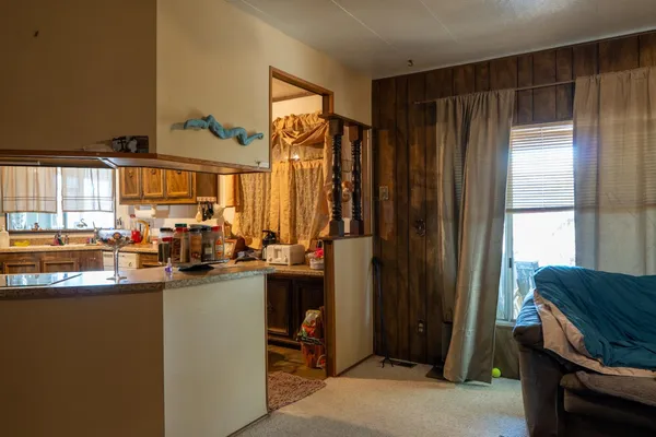 a view of a living room and a window