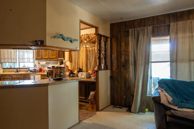 a view of a living room and a window