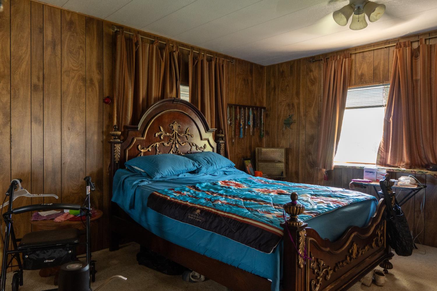 2500 North State Highway, Unit 36 Merced, CA 95348 - Photo 23 of 50 a bedroom with a bed and a dresser