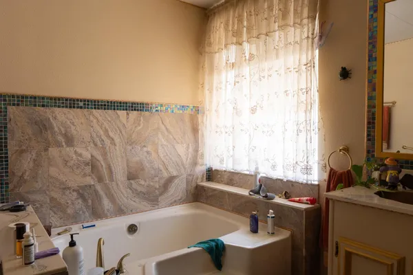 a bathroom with a sink and a bathtub