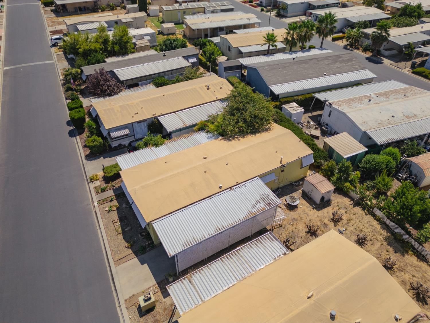 2500 North State Highway, Unit 36 Merced, CA 95348 - Photo 41 of 50 an aerial view of a house with a yard