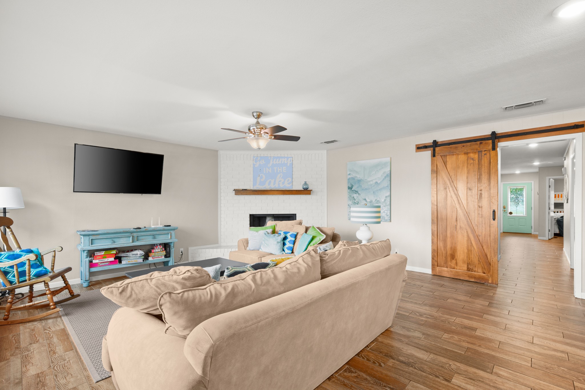 508 Riverside Drive Kingsland, TX 78639 - Photo 11 of 39 a living room with furniture and a flat screen tv