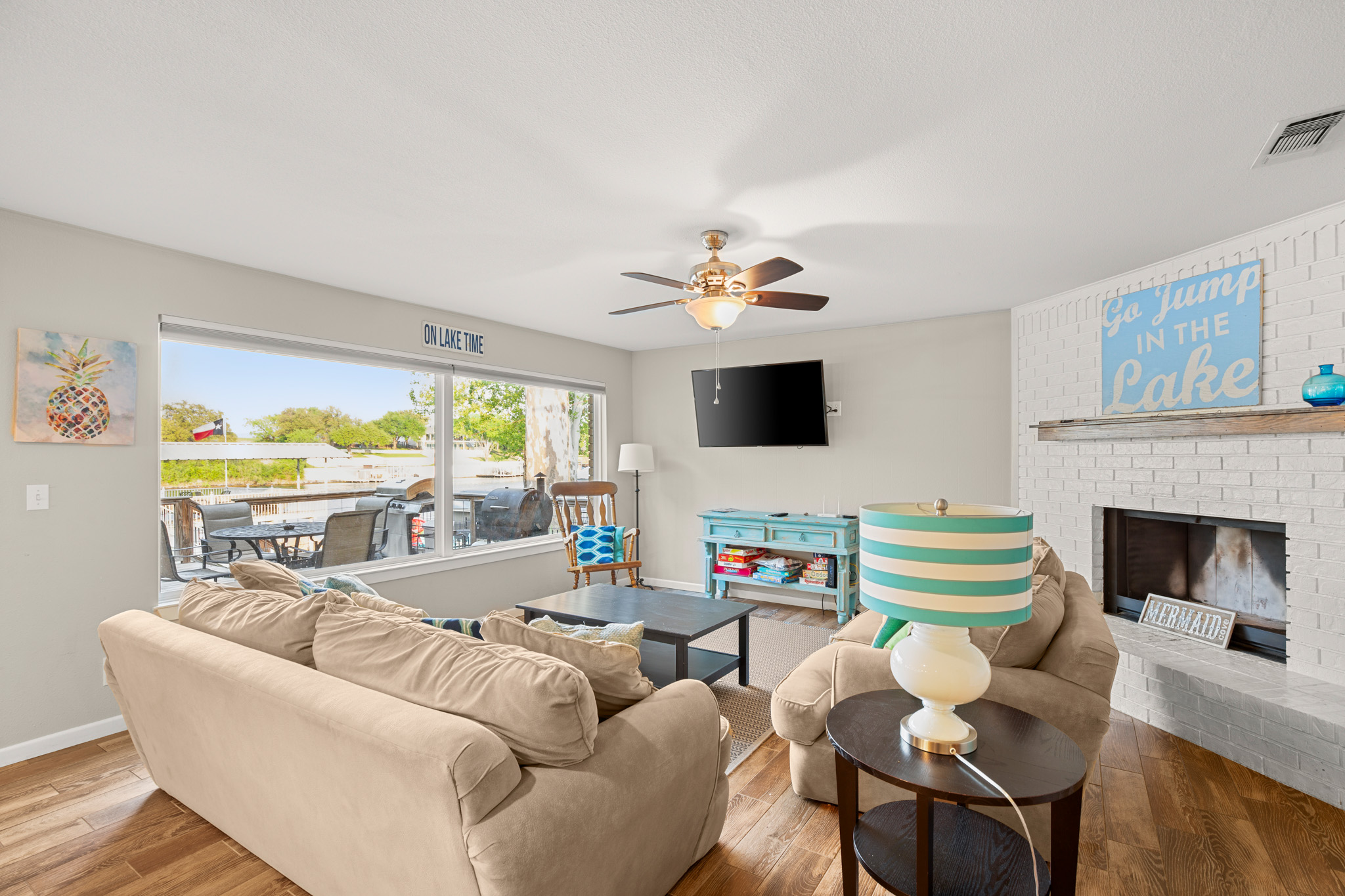 508 Riverside Drive Kingsland, TX 78639 - Photo 14 of 39 a living room with furniture fireplace and a flat screen tv