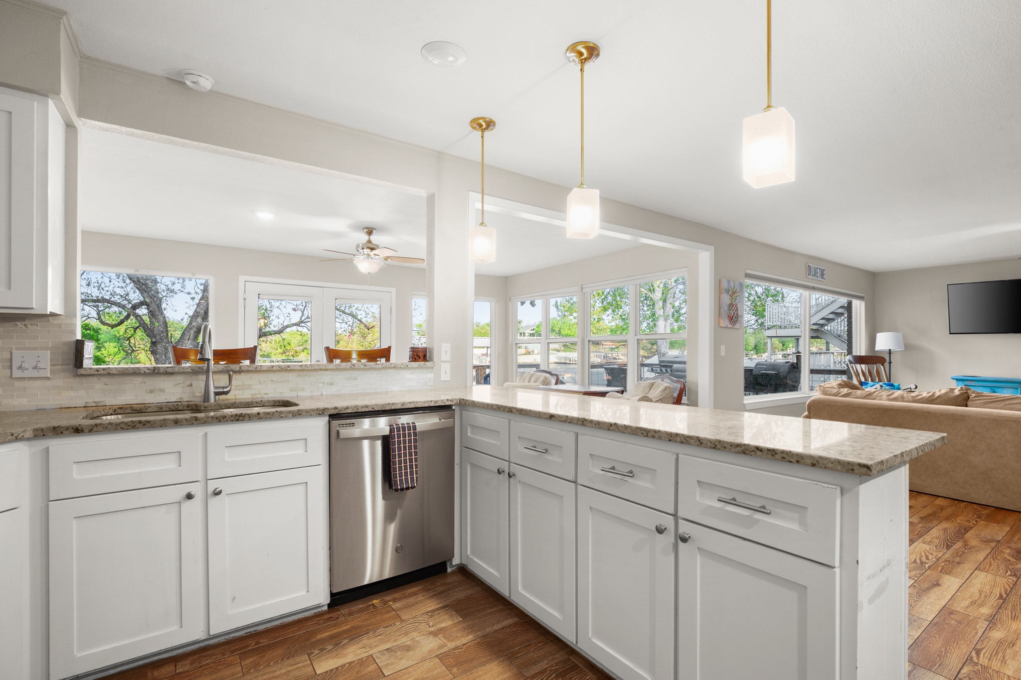 508 Riverside Drive Kingsland, TX 78639 - Photo 17 of 39 a kitchen with white cabinets and sink