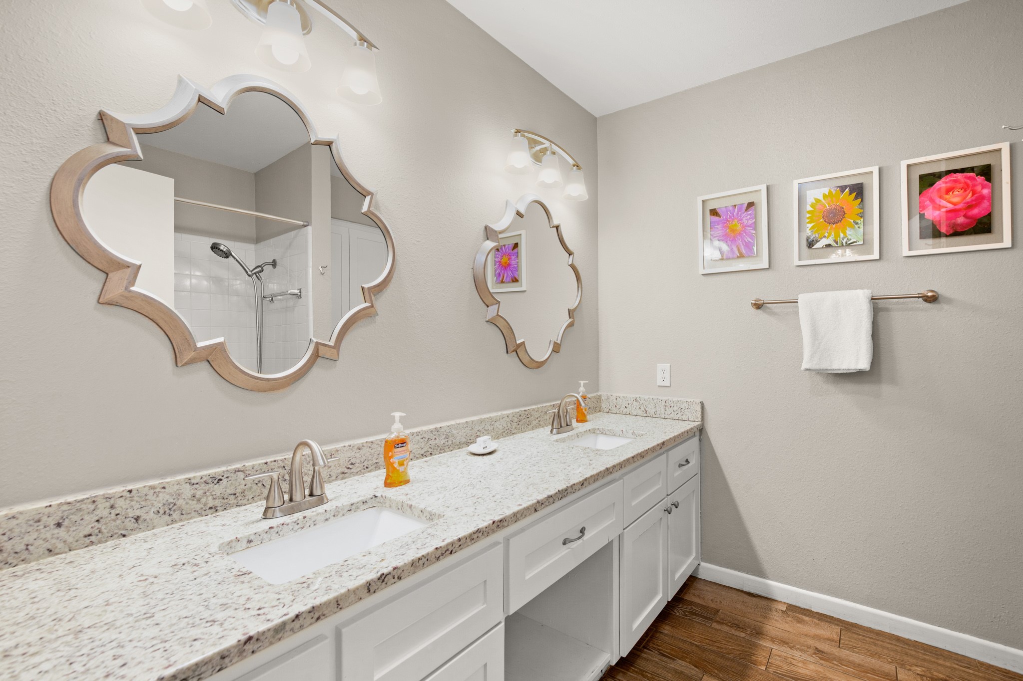 508 Riverside Drive Kingsland, TX 78639 - Photo 21 of 39 a bathroom with a double vanity sink and a mirror