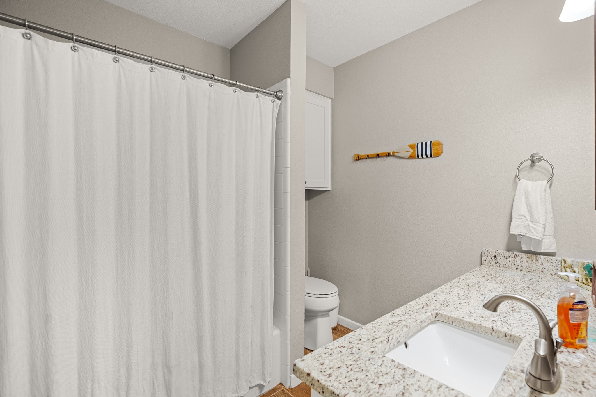 508 Riverside Drive Kingsland, TX 78639 - Photo 23 of 39 a bathroom with a sink and a toilet