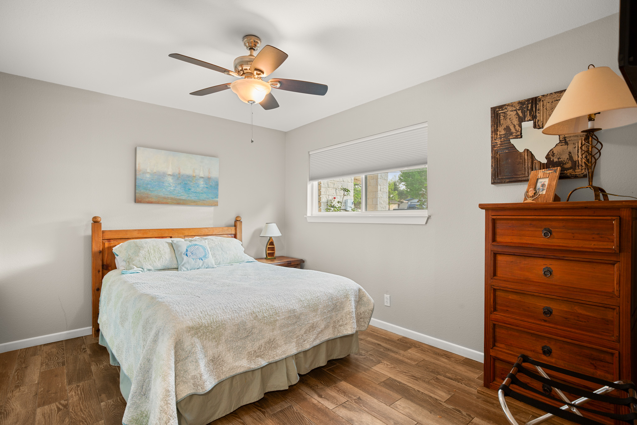 508 Riverside Drive Kingsland, TX 78639 - Photo 27 of 39 a bedroom with a bed and a dresser