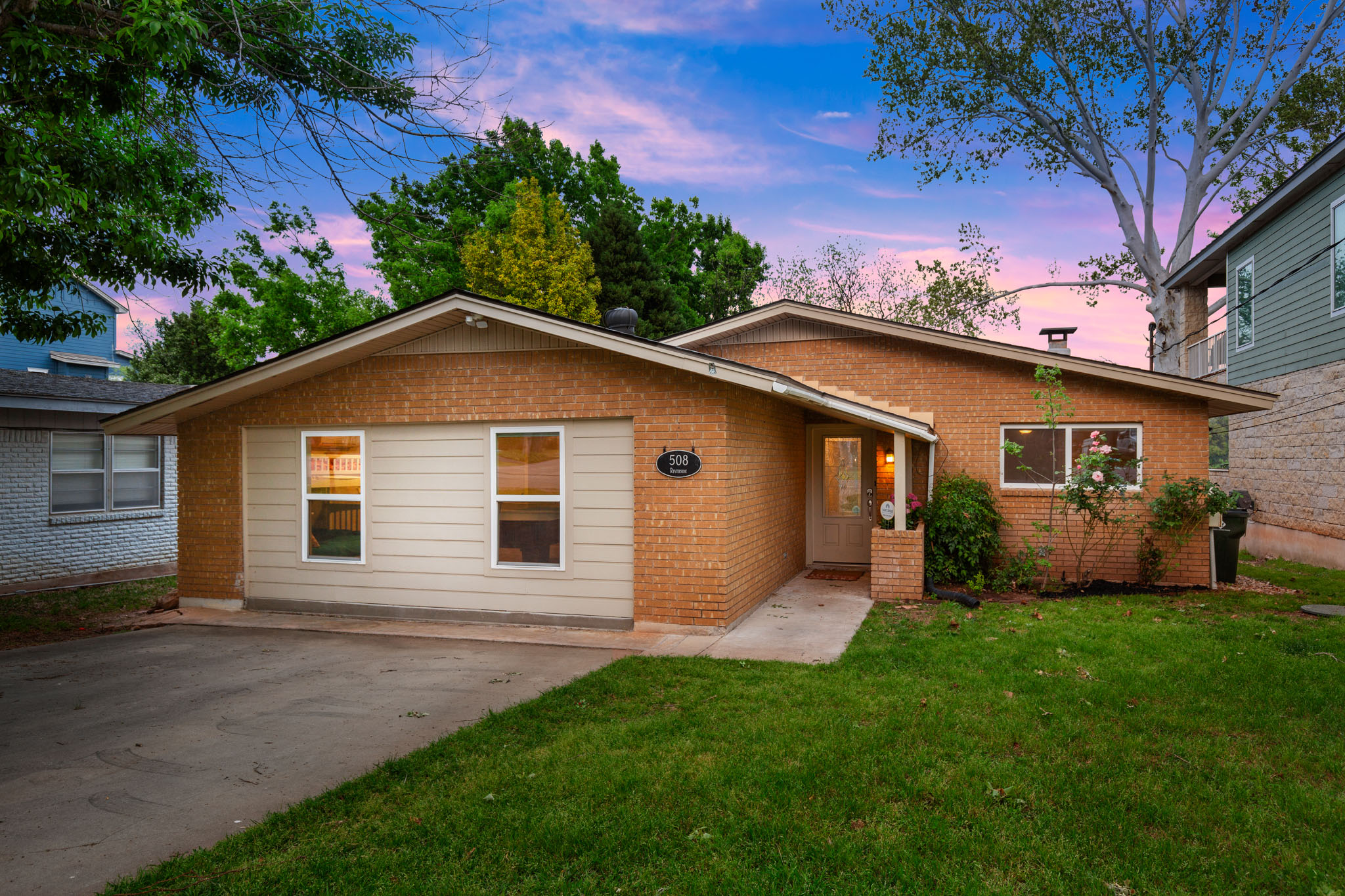 508 Riverside Drive Kingsland, TX 78639 - Photo 32 of 39 a front view of house with yard and green space