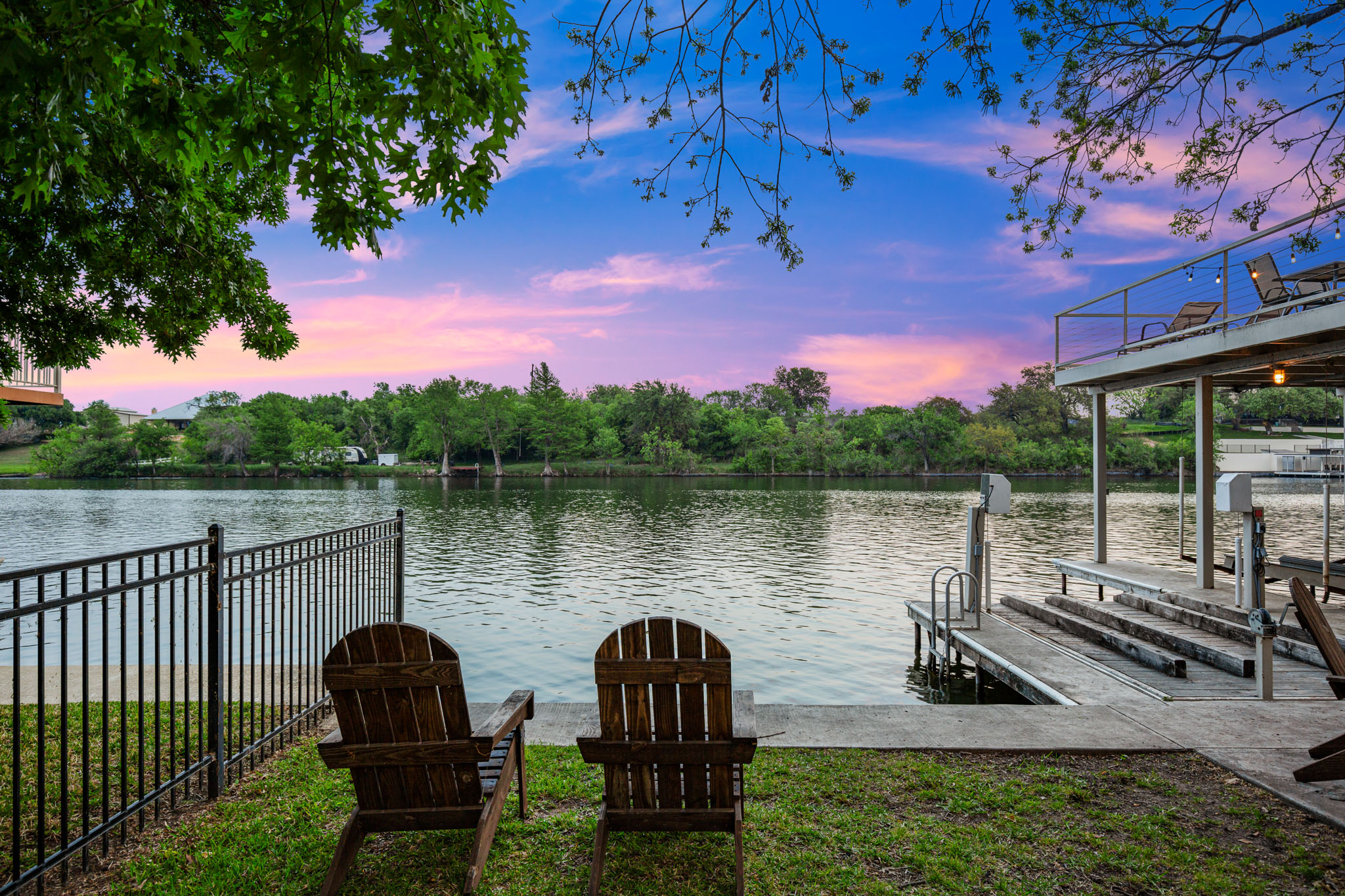 508 Riverside Drive Kingsland, TX 78639 - Photo 38 of 39 a lake view with a sitting space and hardwood