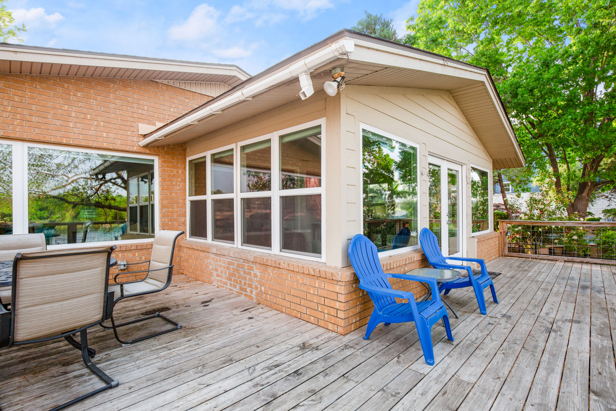 508 Riverside Drive Kingsland, TX 78639 - Photo 7 of 39 a balcony with wooden floor and furniture