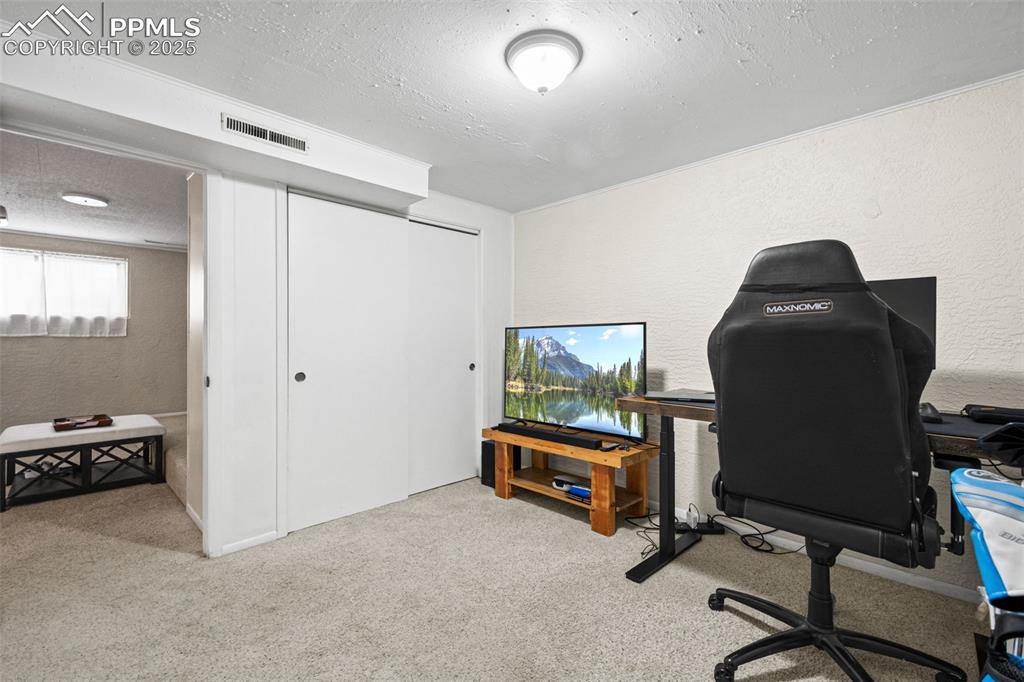 3716 Indianpipe Circle Colorado Springs, CO 80918 - Photo 23 of 33 a view of workspace with gym equipment