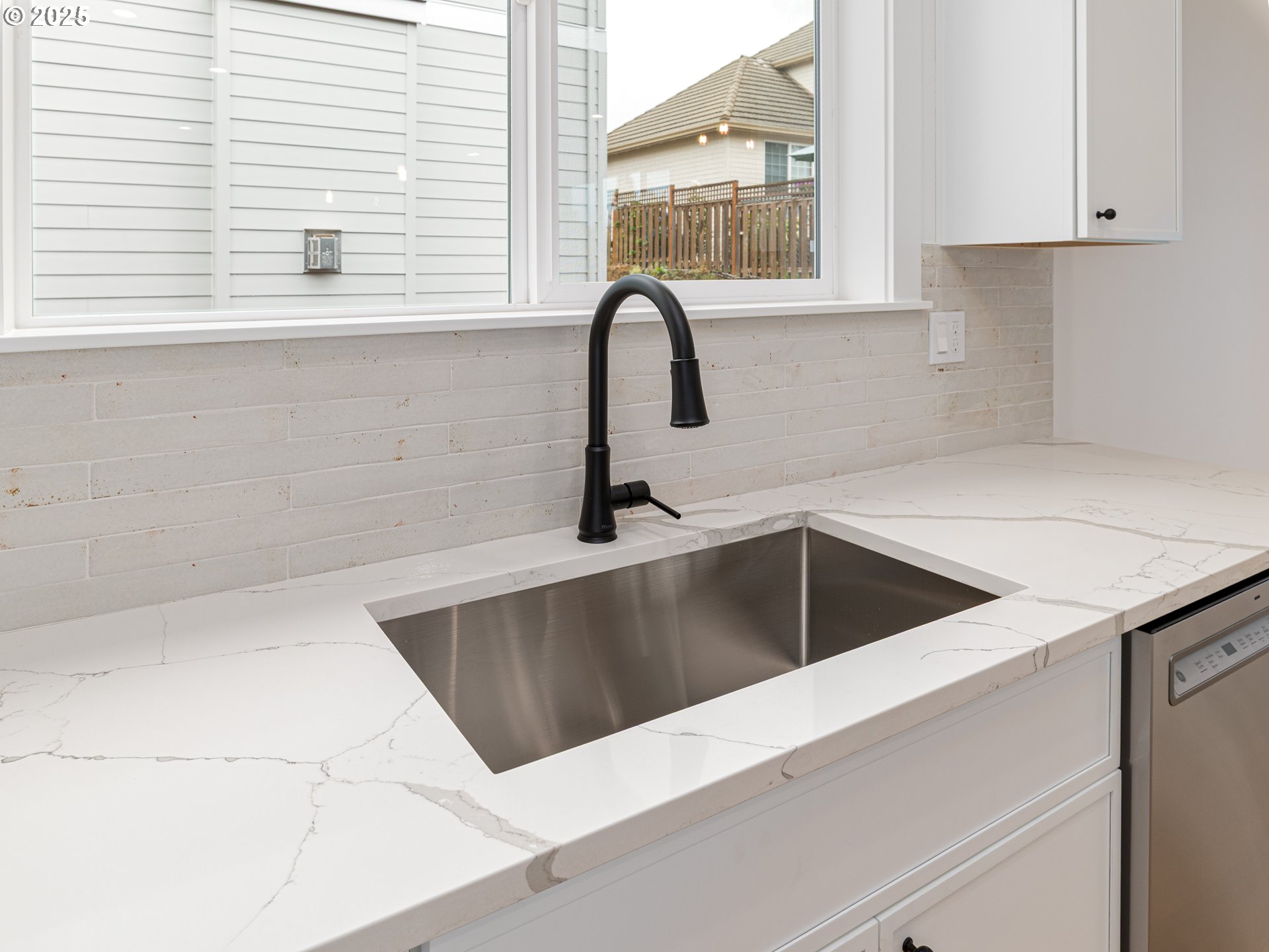 2263 Southwest Phyllis Place Gresham, OR 97080 - Photo 11 of 34 a kitchen with a sink and cabinets