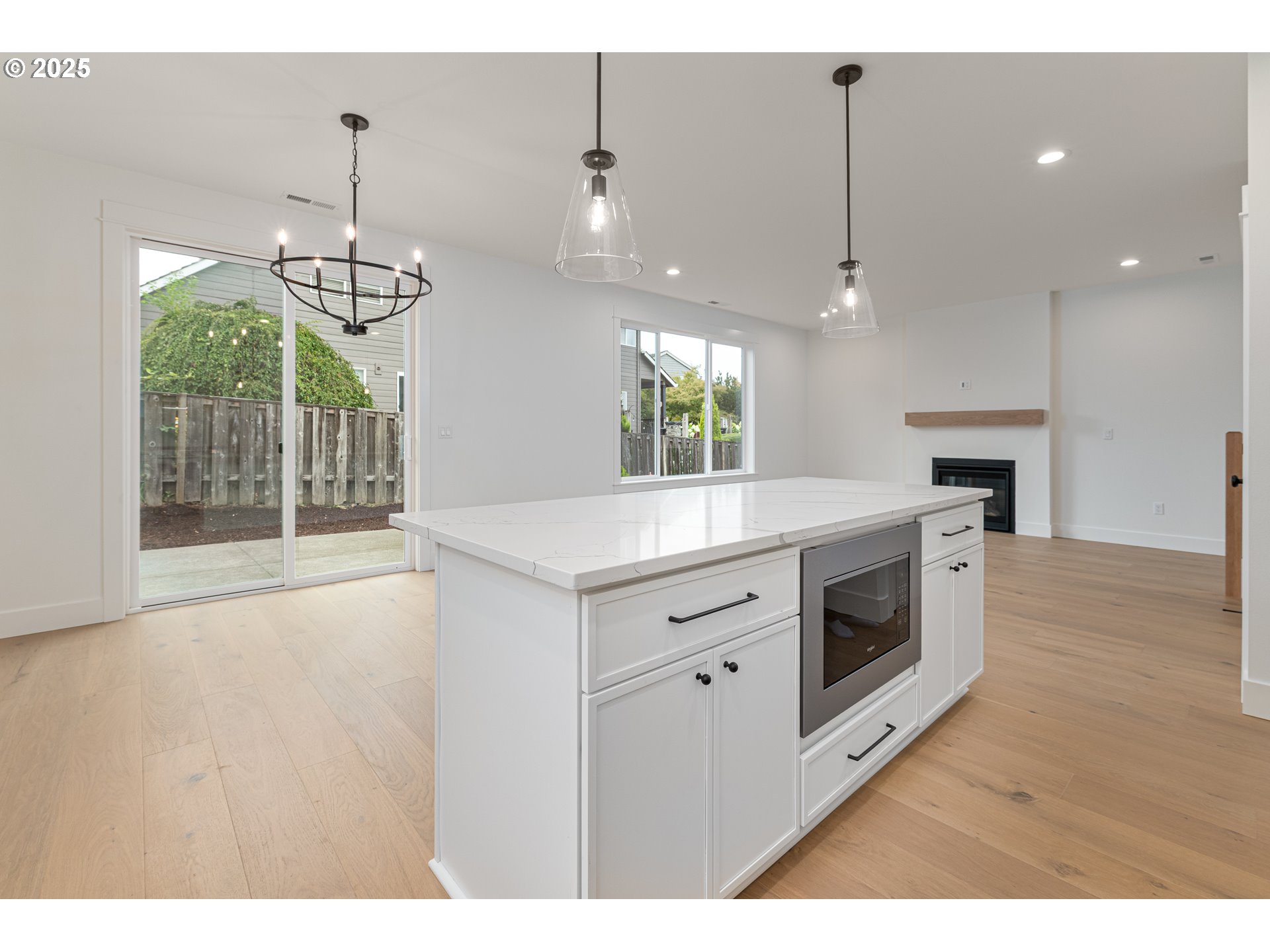 2263 Southwest Phyllis Place Gresham, OR 97080 - Photo 12 of 34 a view of kitchen with sink microwave and stove top oven