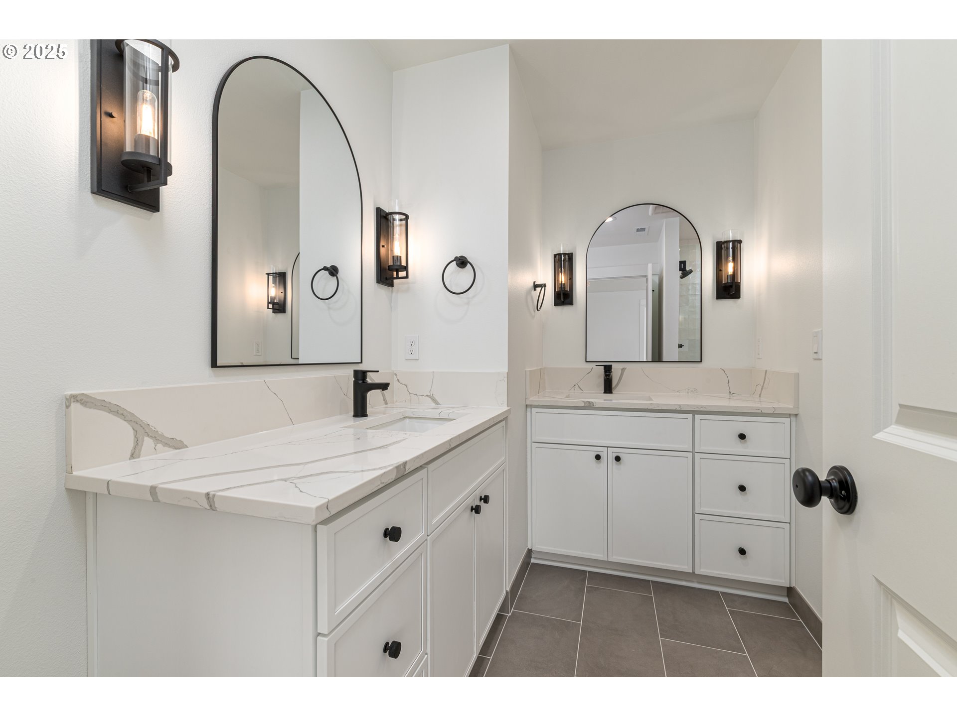 2263 Southwest Phyllis Place Gresham, OR 97080 - Photo 22 of 34 a bathroom with a double vanity sink and a mirror