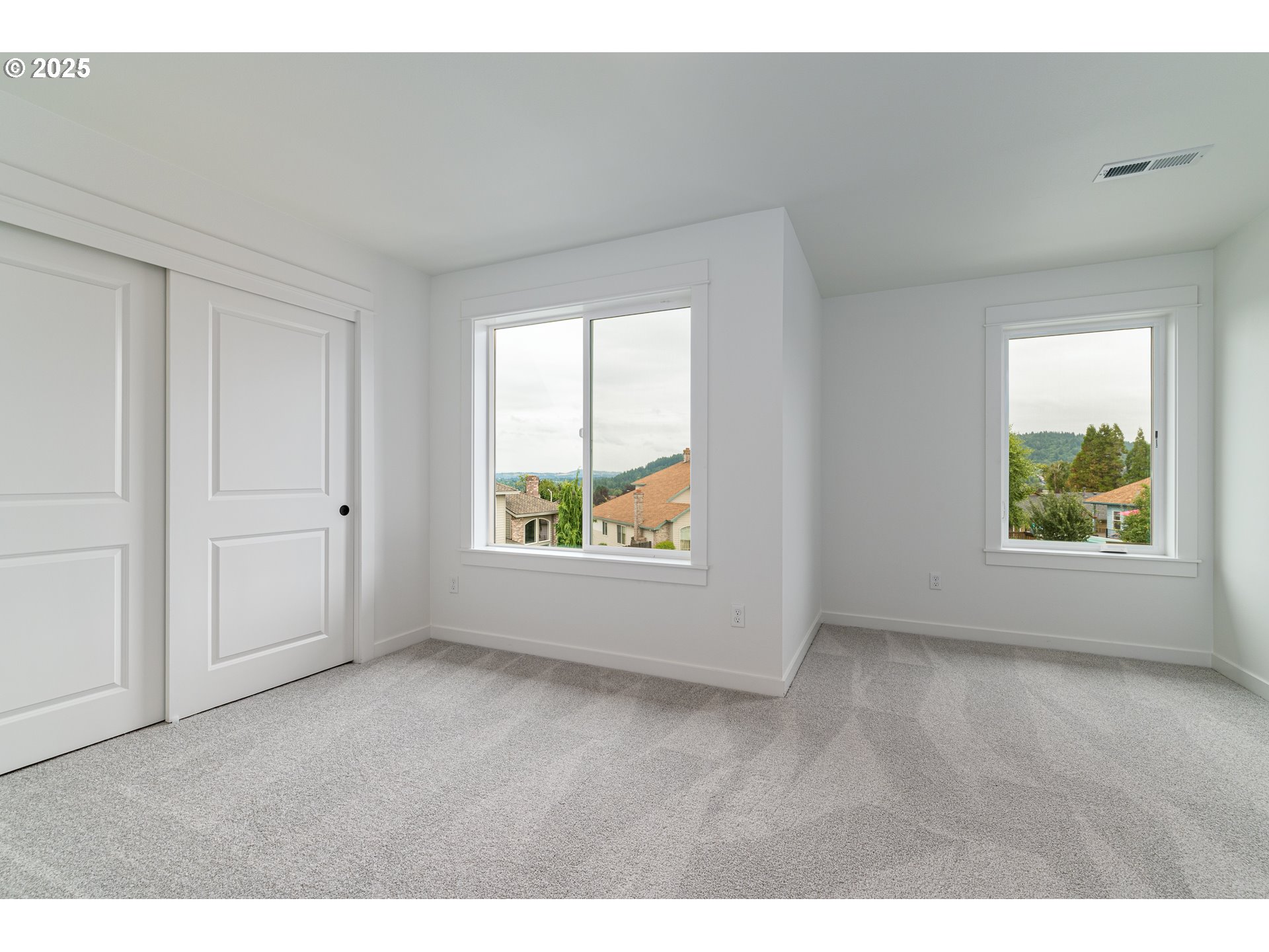 2263 Southwest Phyllis Place Gresham, OR 97080 - Photo 25 of 34 a view of an empty room with a window