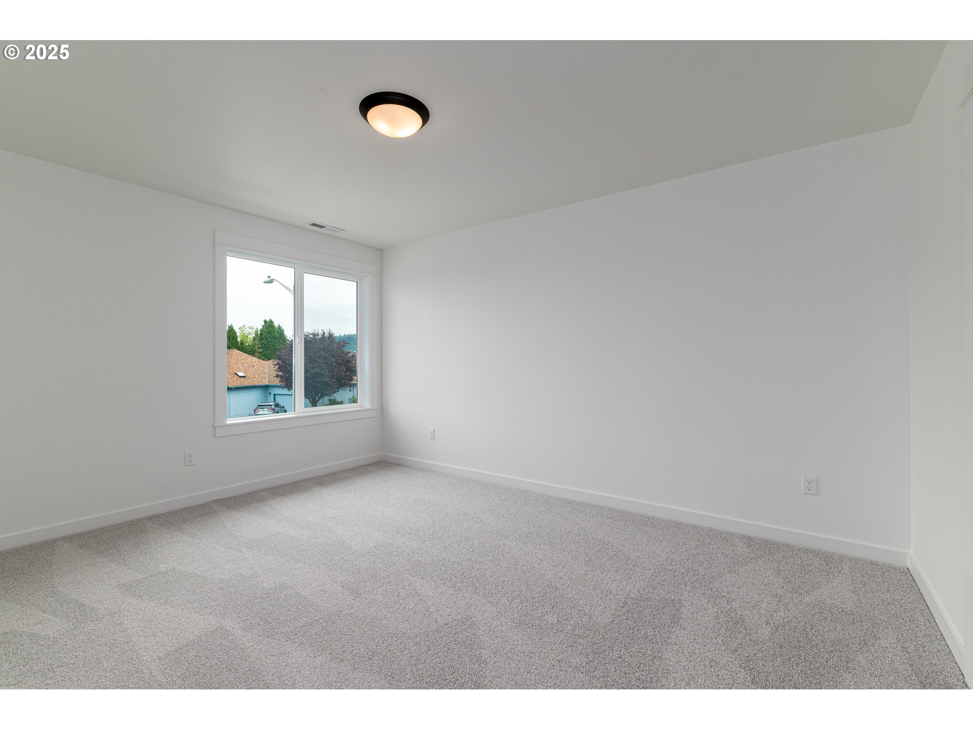 2263 Southwest Phyllis Place Gresham, OR 97080 - Photo 30 of 34 a view of an empty room with windows