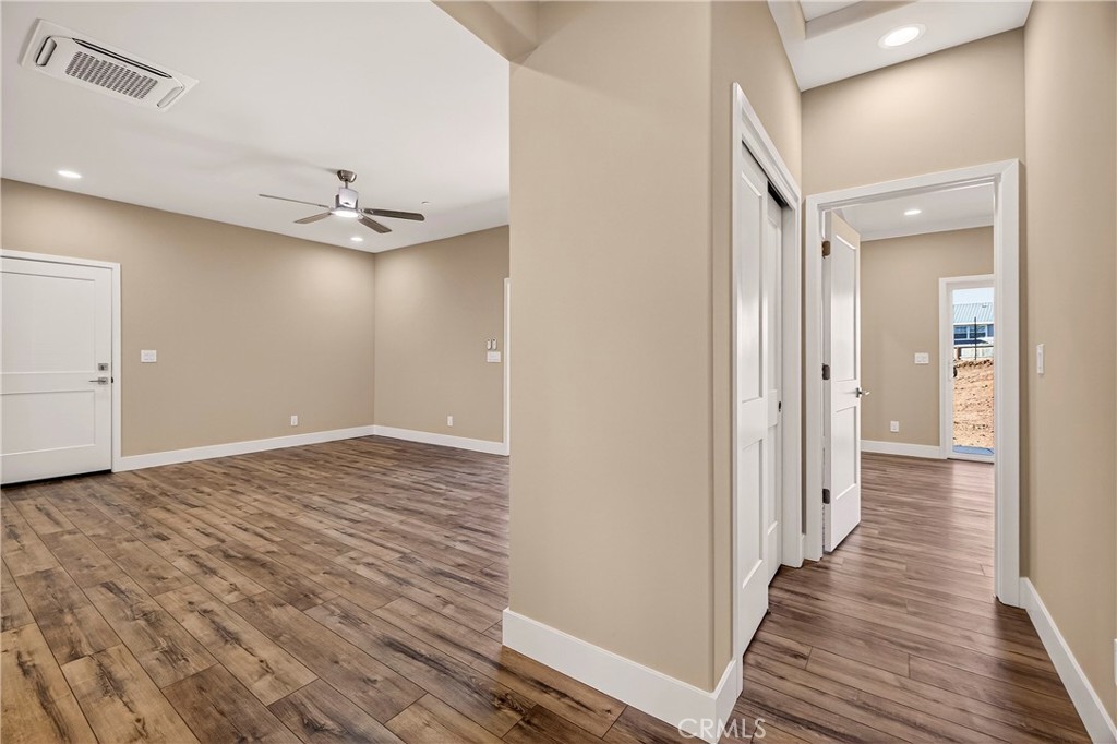 5617 Scottwood Road Paradise, CA 95969 - Photo 17 of 55 a view of a hallway with wooden floor