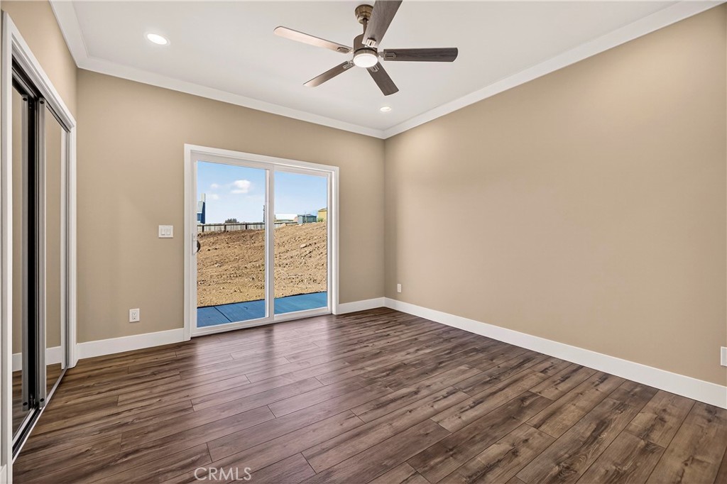 5617 Scottwood Road Paradise, CA 95969 - Photo 18 of 55 wooden floor in an empty room with a window