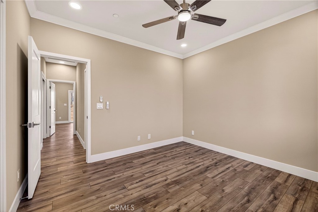 5617 Scottwood Road Paradise, CA 95969 - Photo 25 of 55 a view of an empty room with wooden floor