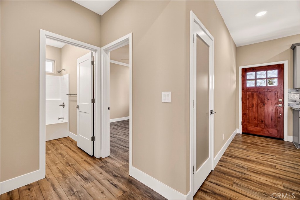 5617 Scottwood Road Paradise, CA 95969 - Photo 26 of 55 a view of a hallway with wooden floor and closet area