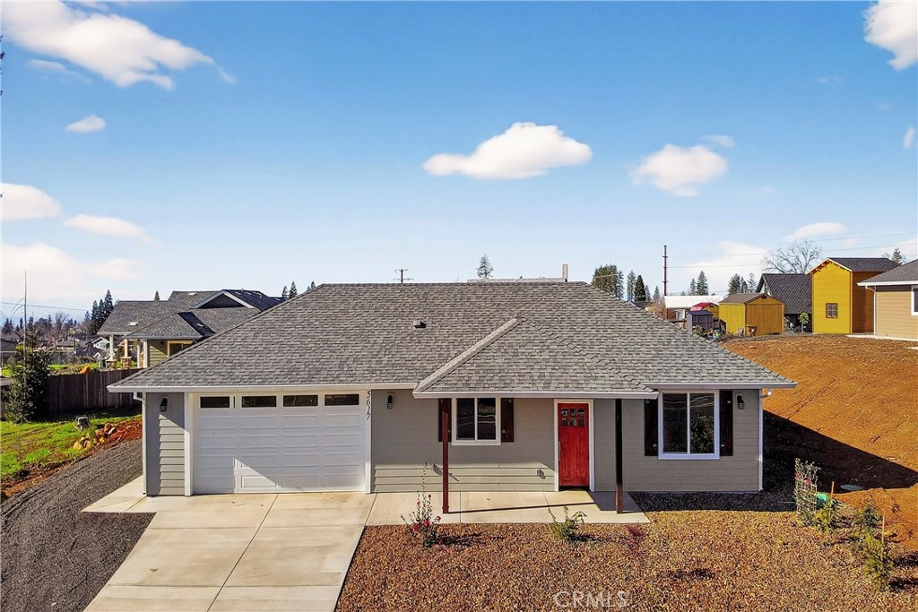 5617 Scottwood Road Paradise, CA 95969 - Photo 3 of 55 a front view of a house with a yard