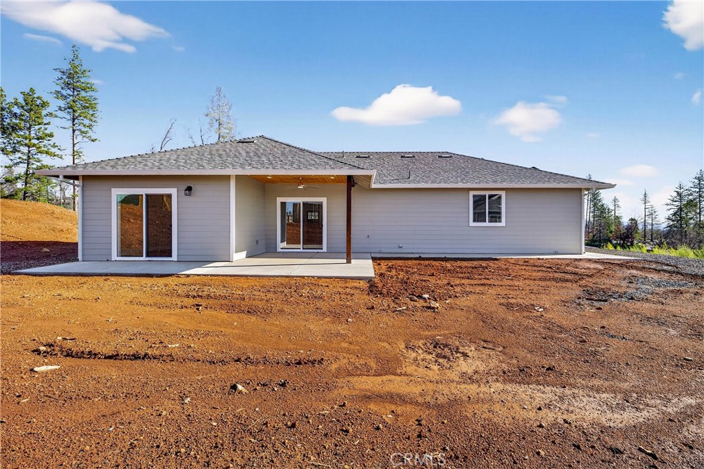5617 Scottwood Road Paradise, CA 95969 - Photo 32 of 55 a view of house with yard and swimming pool