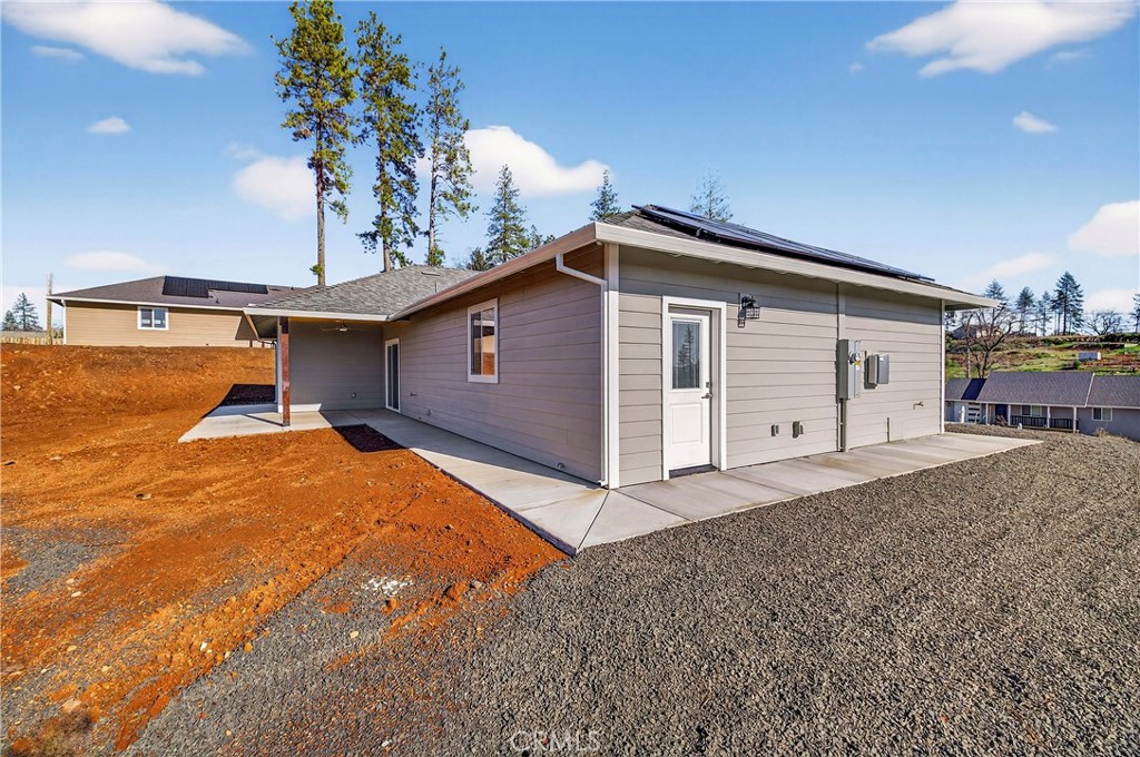 5617 Scottwood Road Paradise, CA 95969 - Photo 34 of 55 a view of a house with a backyard