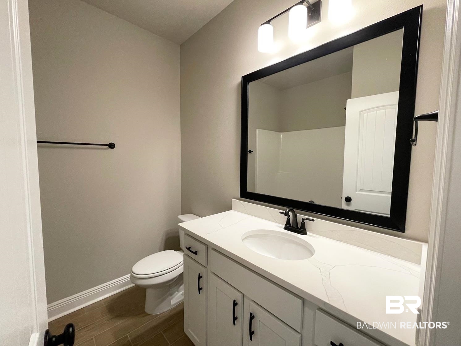 1392 Fenton Circle Foley, AL 36535 - Photo 12 of 17 Bathroom with vanity and toilet