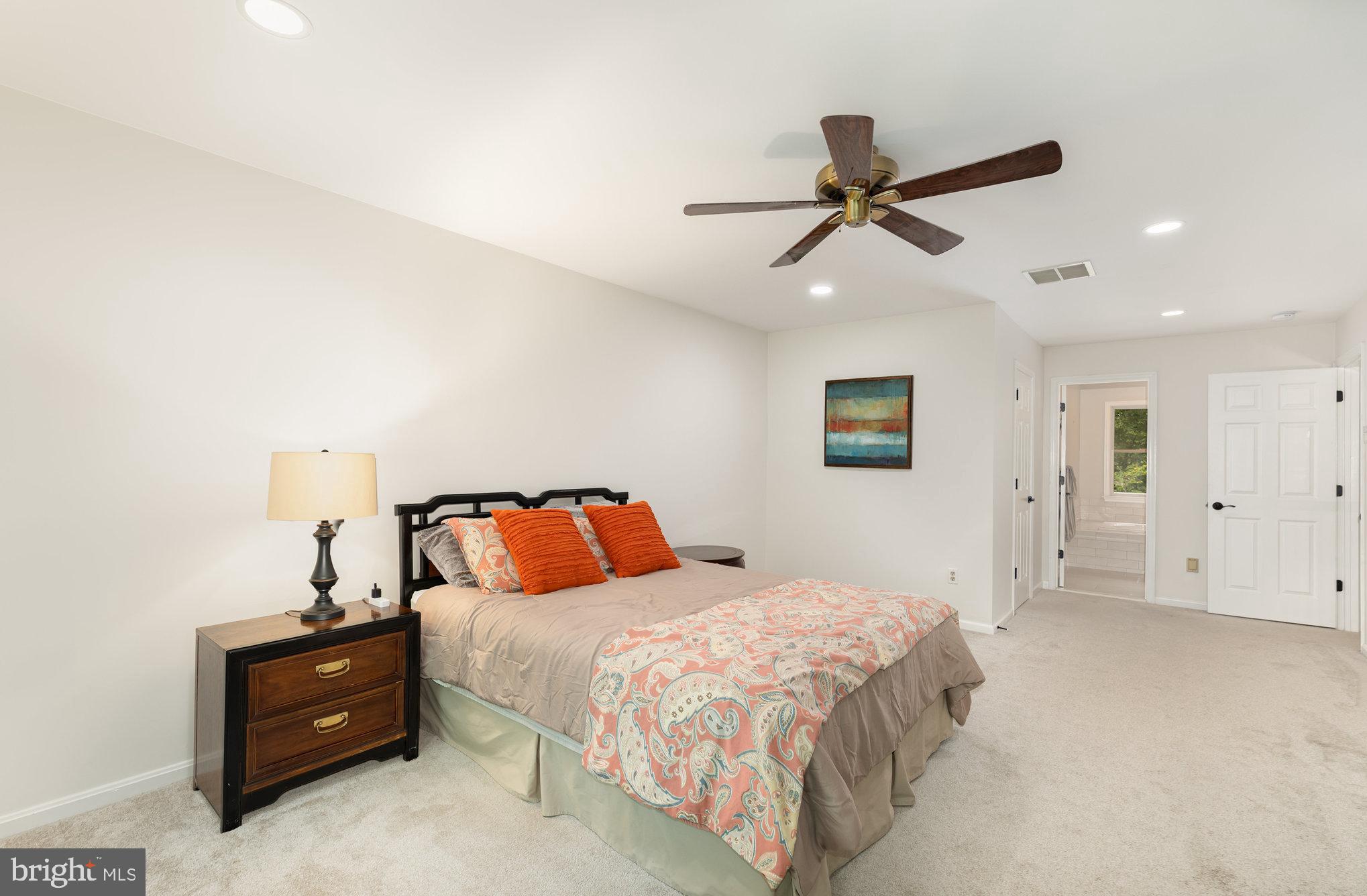2736 Paper Mill Road Phoenix, MD 21131 - Photo 19 of 51 a bedroom with a bed and a ceiling fan