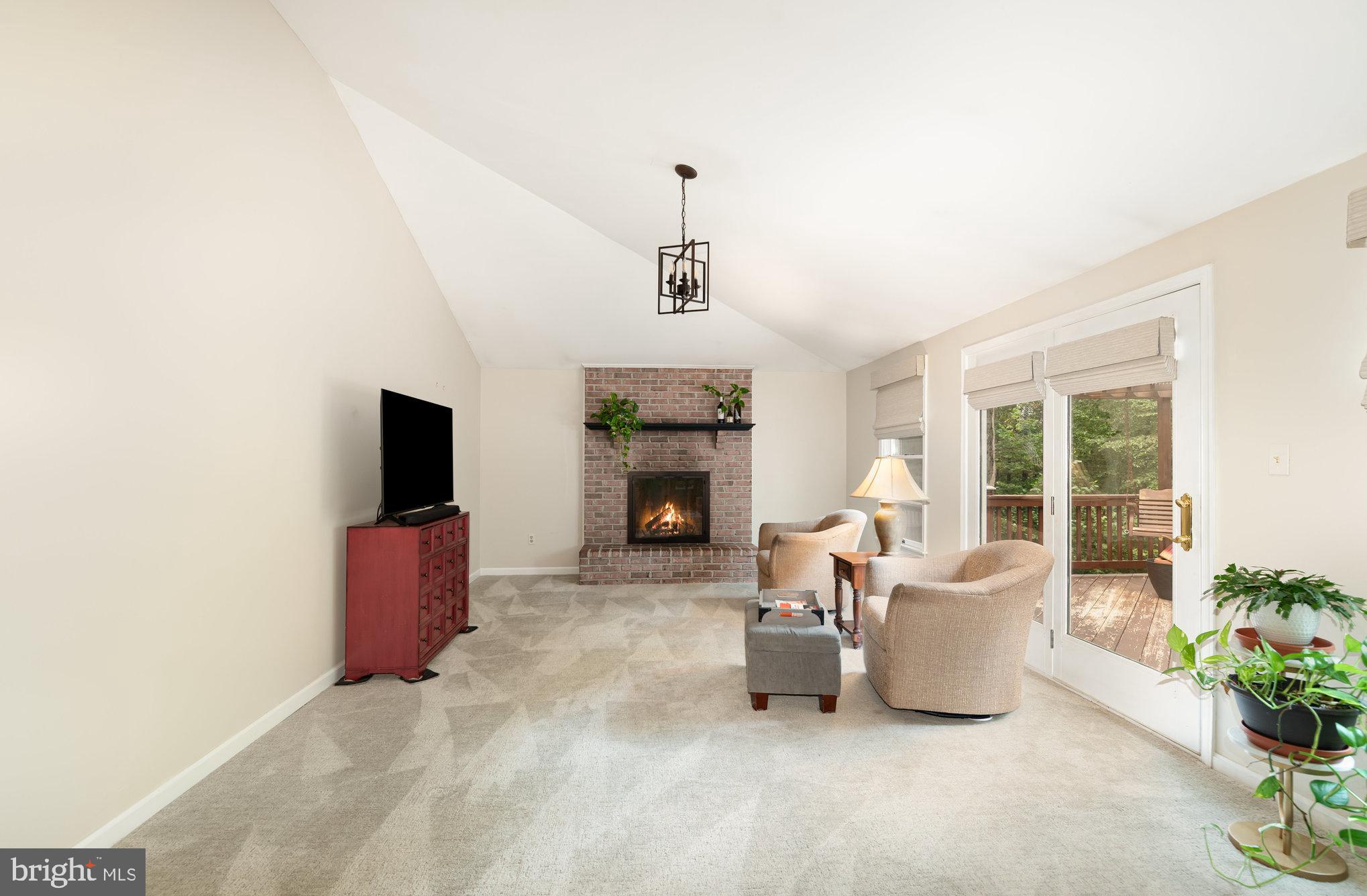 2736 Paper Mill Road Phoenix, MD 21131 - Photo 7 of 51 a living room with furniture and a fireplace