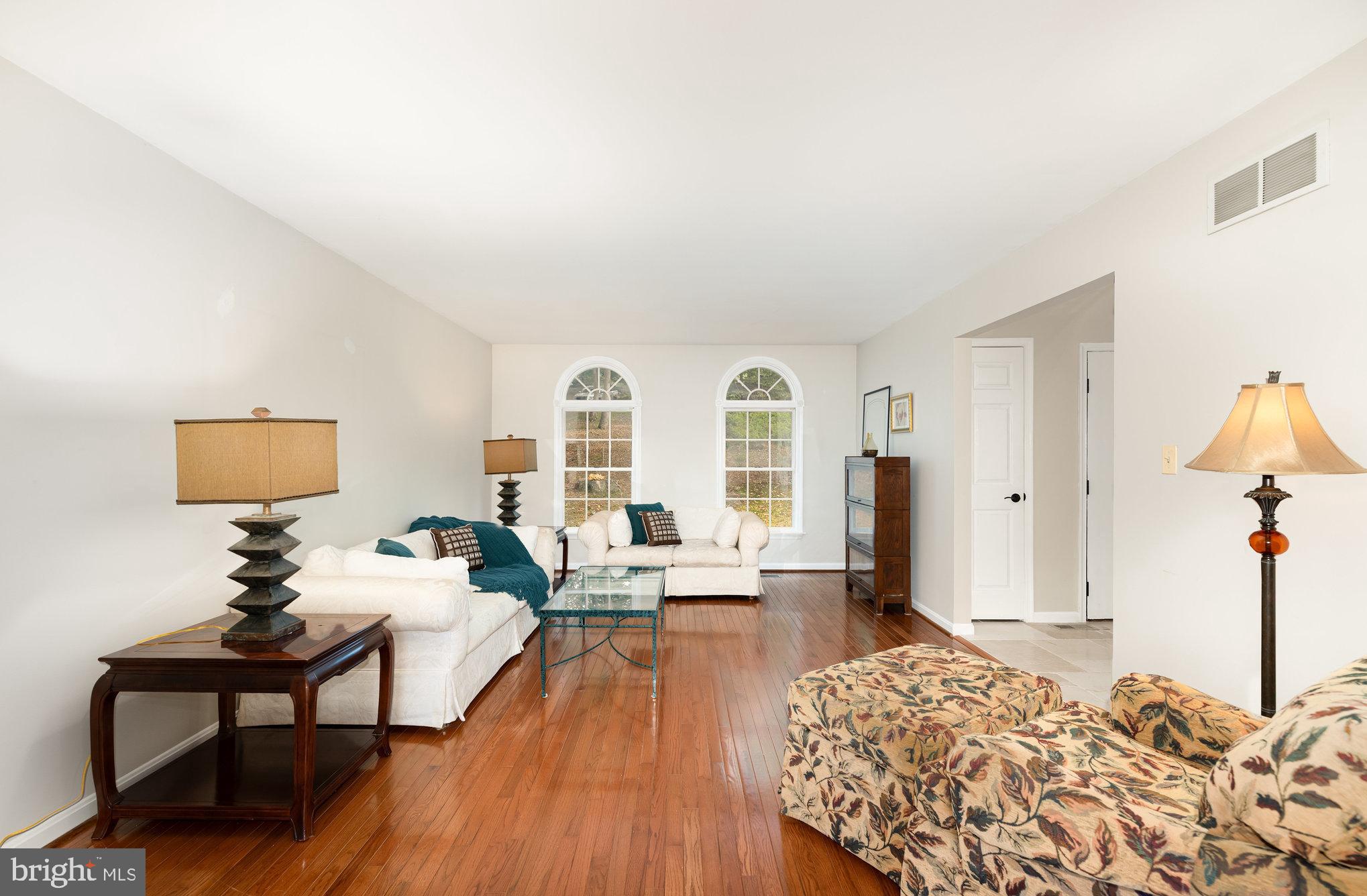 2736 Paper Mill Road Phoenix, MD 21131 - Photo 9 of 51 a living room with furniture and a wooden floor