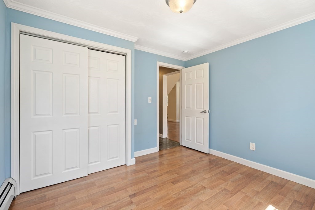 15 Ruthellen Road Chelmsford, MA 01824 - Photo 13 of 34 an empty room with wooden floor