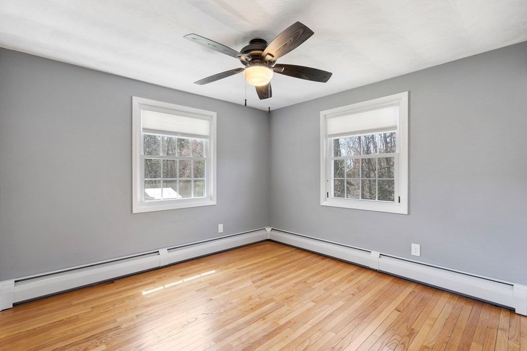 15 Ruthellen Road Chelmsford, MA 01824 - Photo 19 of 34 an empty room with window and ceiling fan
