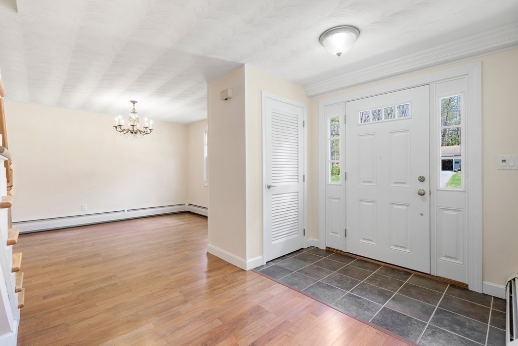 15 Ruthellen Road Chelmsford, MA 01824 - Photo 7 of 34 an empty room with wooden floor