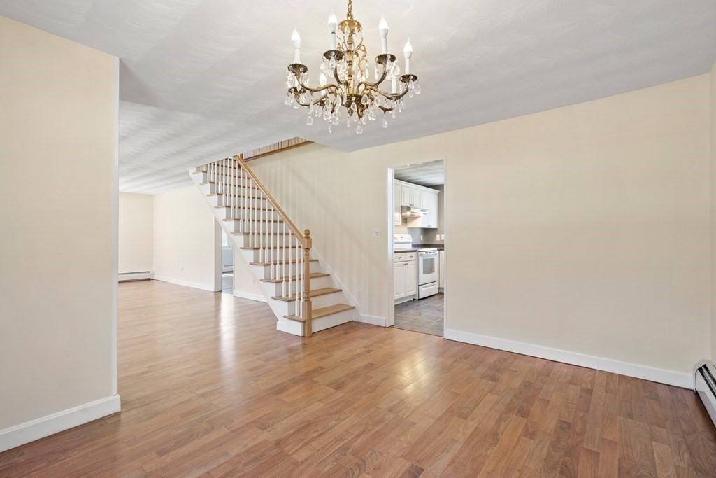 15 Ruthellen Road Chelmsford, MA 01824 - Photo 8 of 34 a view of entryway with wooden floor